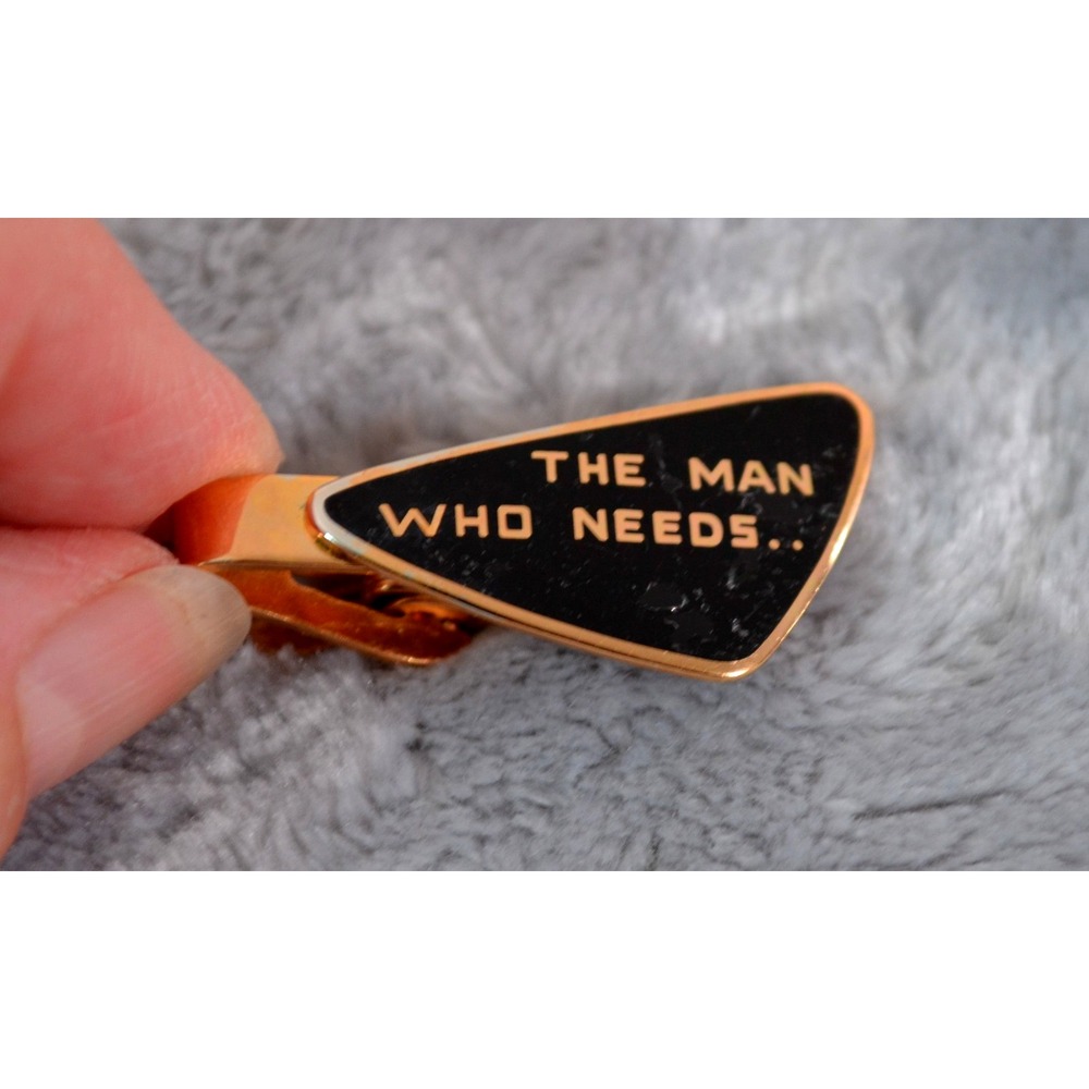 Vintage MCM "The Man Who Needs" Slogan Tie Bar Clip Gold Tone Black Enamel